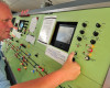 Level crossing control panel and man